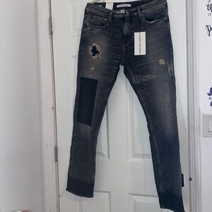 Calvin Klein Black Wash Denim with Distress and Patchwork